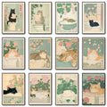 Set of twelve framed vintage-style tabby cat wall art illustrations featuring japanese tabby cats in pastel bathroom scenes