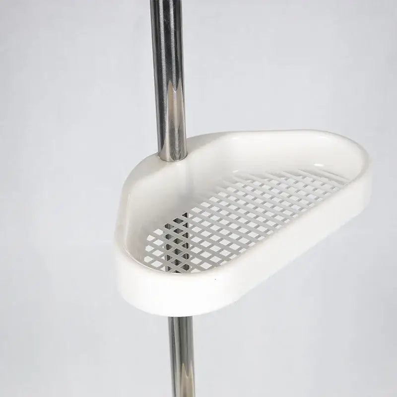 White plastic shower caddy with grid surface mounted on stainless steel pole for DecorBites telescopic shower rack organizer