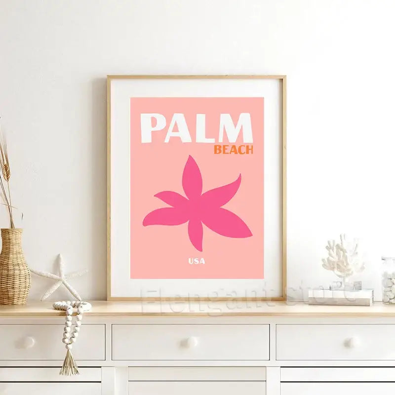 A framed decorbites™ posters art print with pink background and stylized magenta flower reading palm beach usa