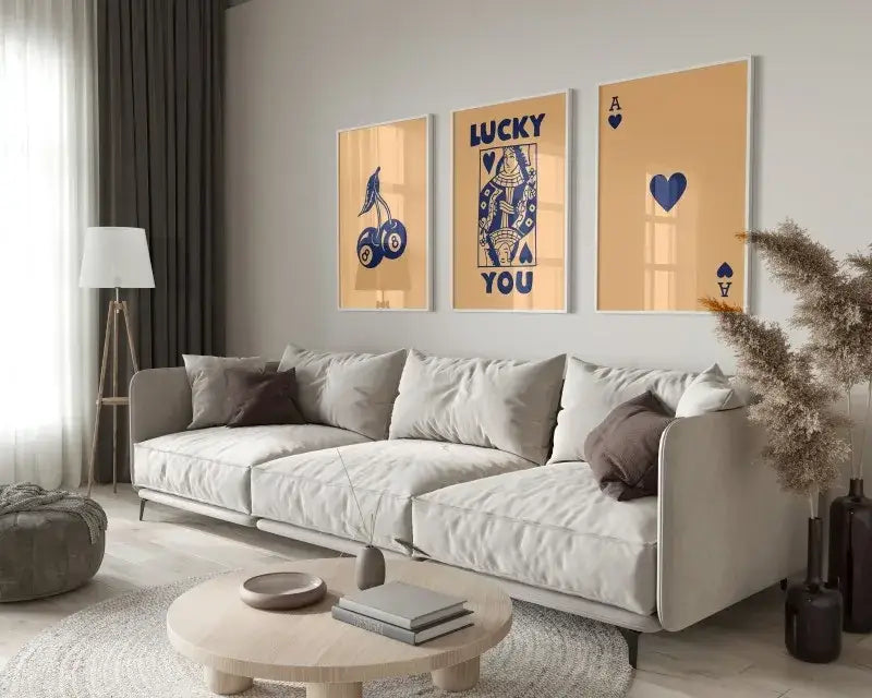 Beige sectional sofa with soft modern upholstery and dark brown pillows in a room featuring decorbites trendy retro wall art posters