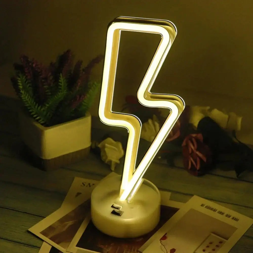 A decorbites™ led neon sign featuring a glowing yellow lightning bolt lamp with a metallic frame and circular base