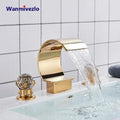 DecorBites™ waterfall bathroom basin faucet in gold with crystal knob and sleek curved polished metallic finish