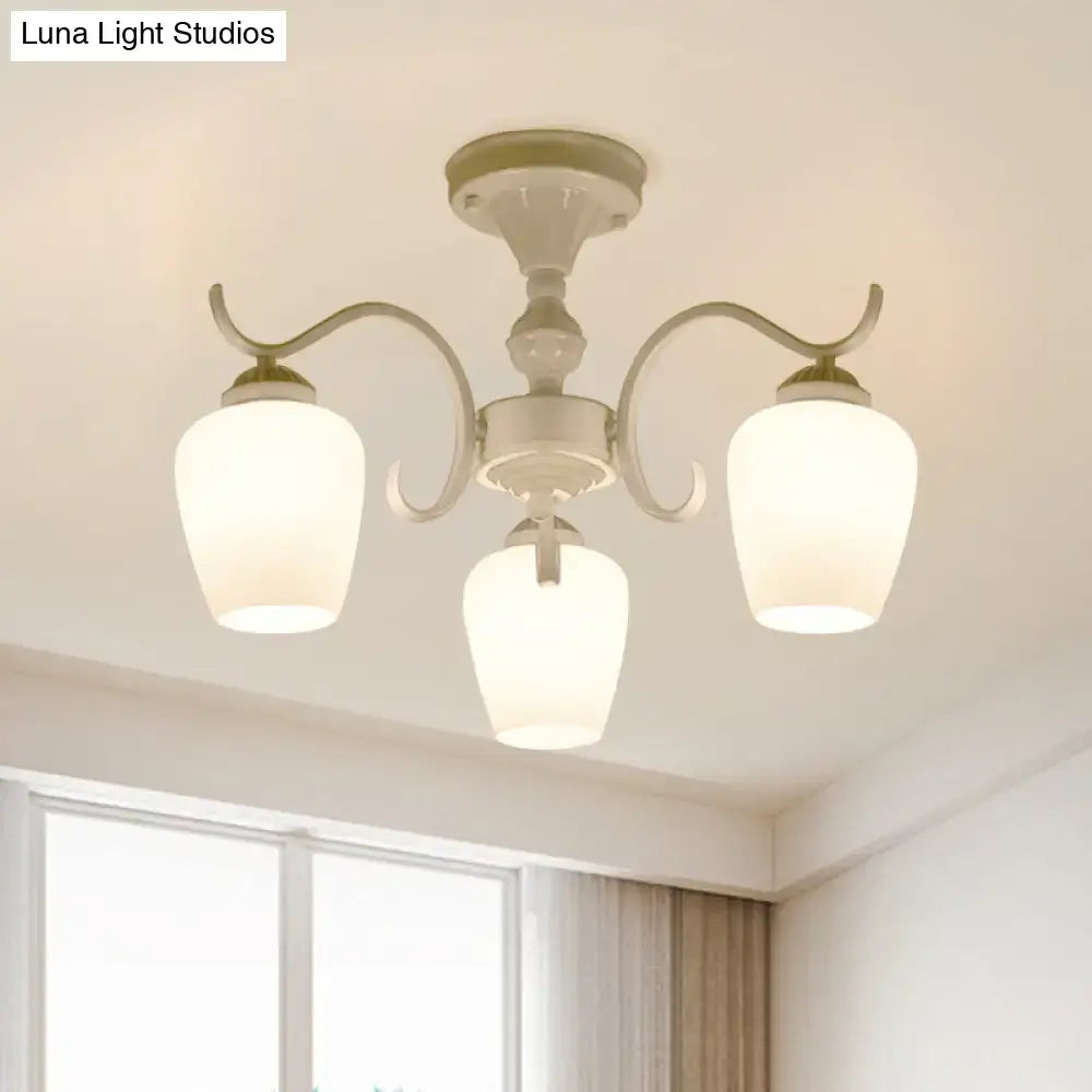 Cream-colored semiflush DecorBites chandelier with three curved arms and frosted opaline glass cone shades
