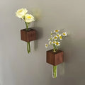 Two dark wood cube magnetic test tube vases with clear glass tubes for diy flower arrangement by decorbites