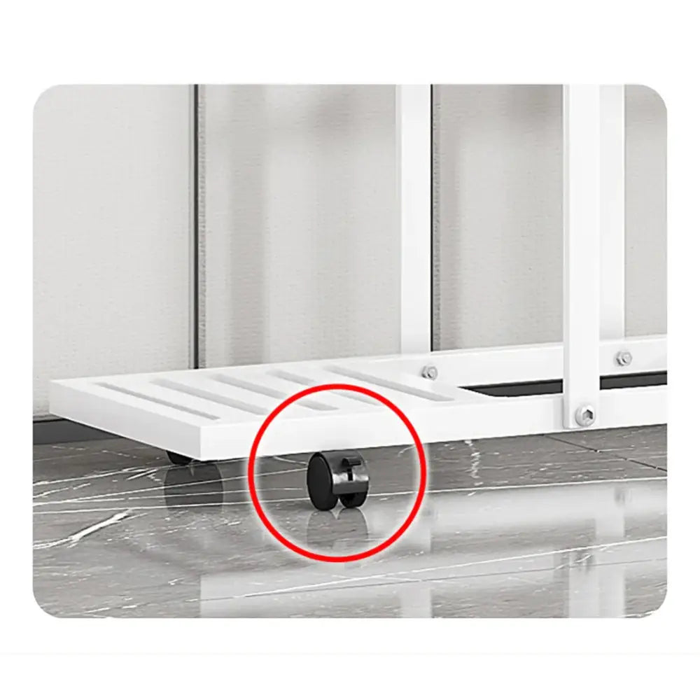 Black caster wheel attached to white wrought iron plant stand for easy mobility in the decorbites™ plant stand