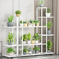 White wrought iron plant stand by DecorBites with multiple shelves and caster wheels for easy mobility