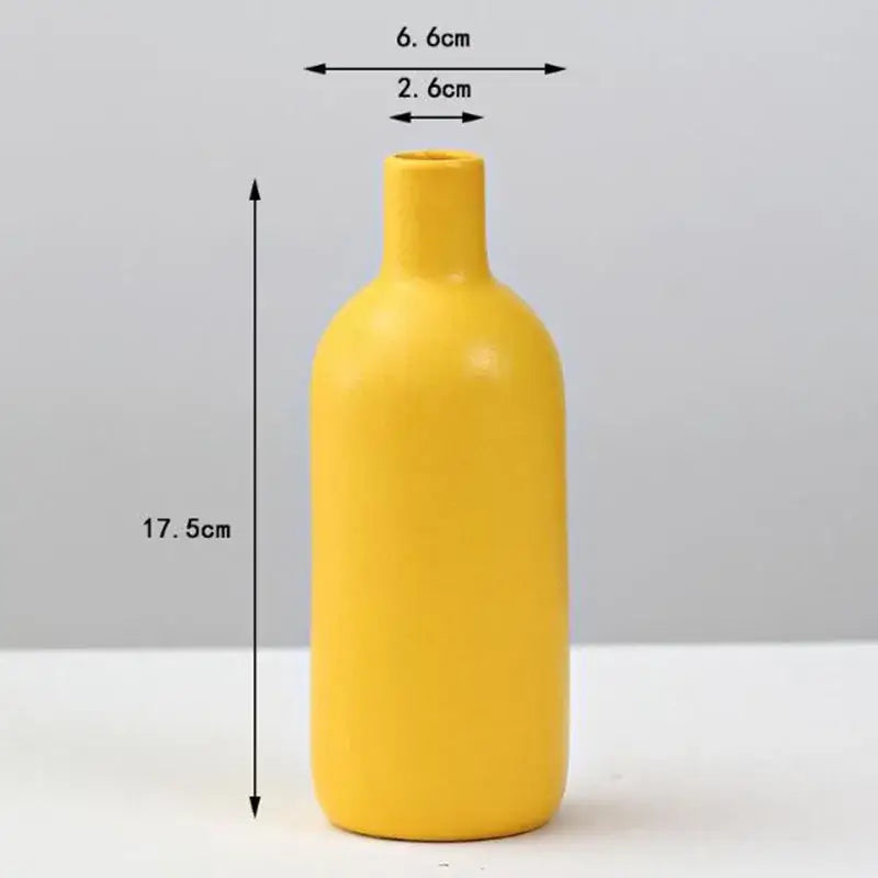 Decorbites™ yellow porcelain flower vase with a sleek matte finish and slender neck for elegant home decor
