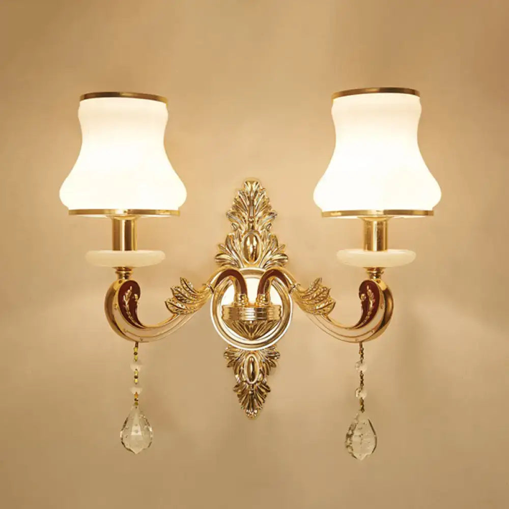 Elegant gold scrolled arm wall mount sconce bedroom crystal light