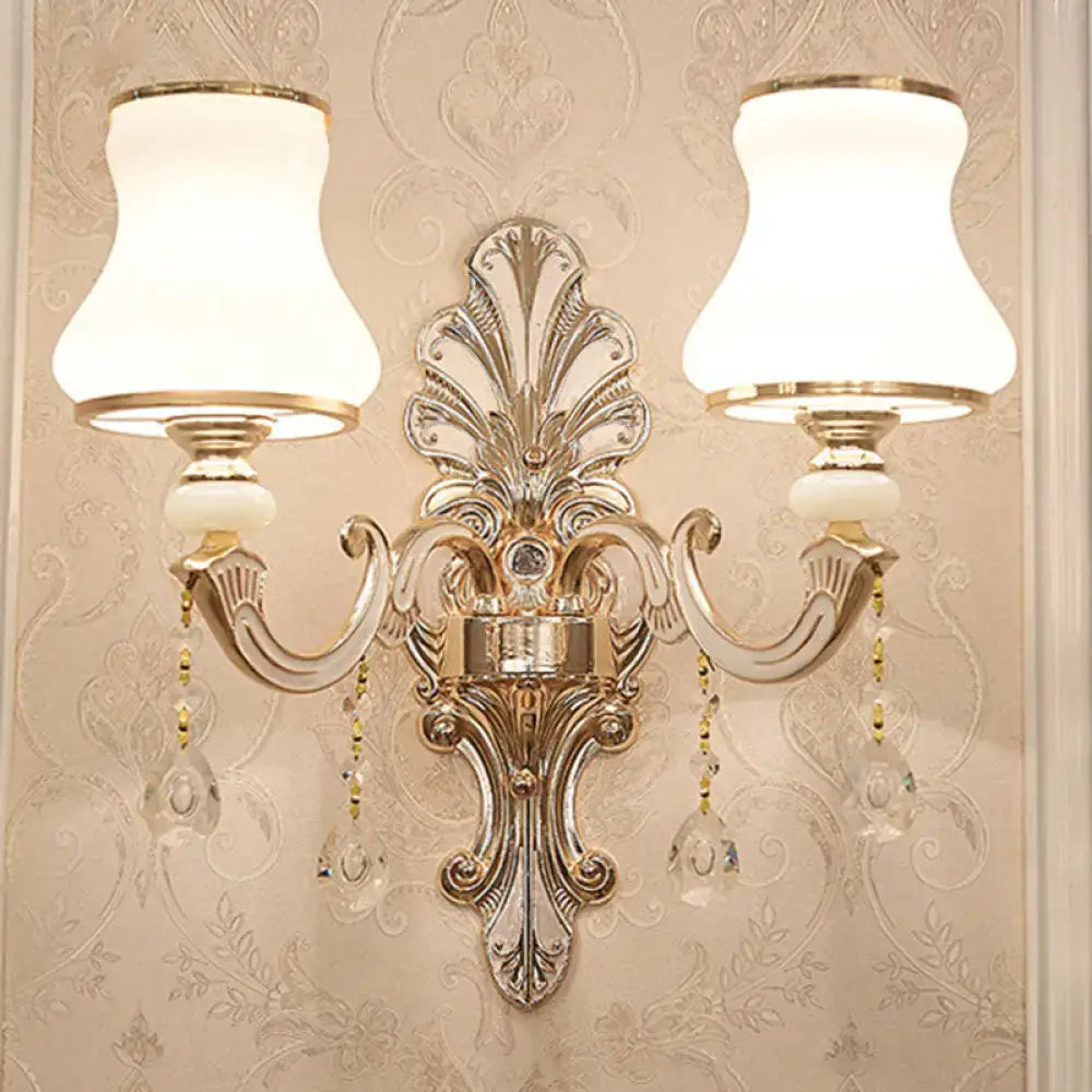 Elegant gold scrolled arm wall mount sconce bedroom crystal light