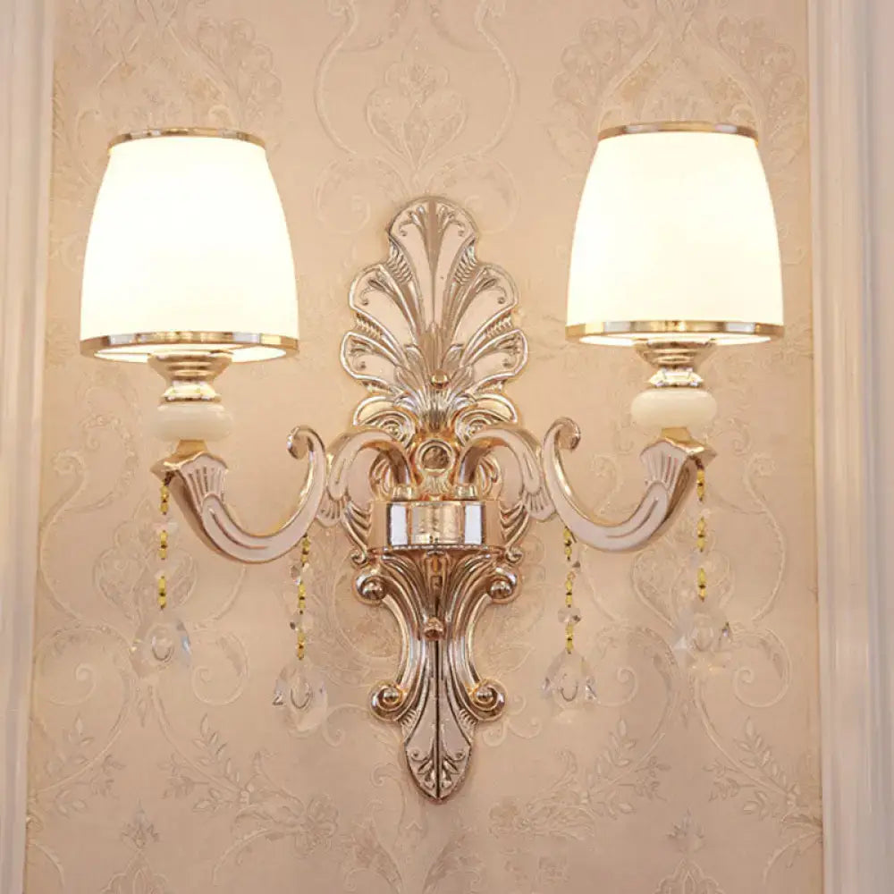 Elegant gold scrolled arm wall mount sconce bedroom crystal light