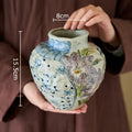 Floral hand painted ceramic vase with artificial flowers living room