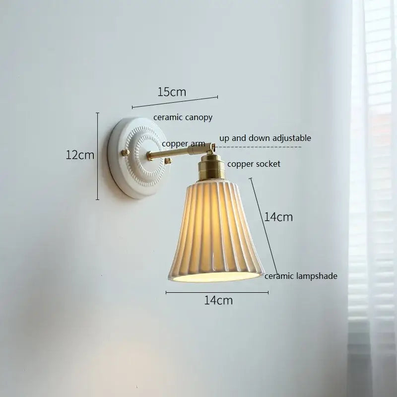 Fluted cream ceramic wall lamp with brass accents – bathroom light