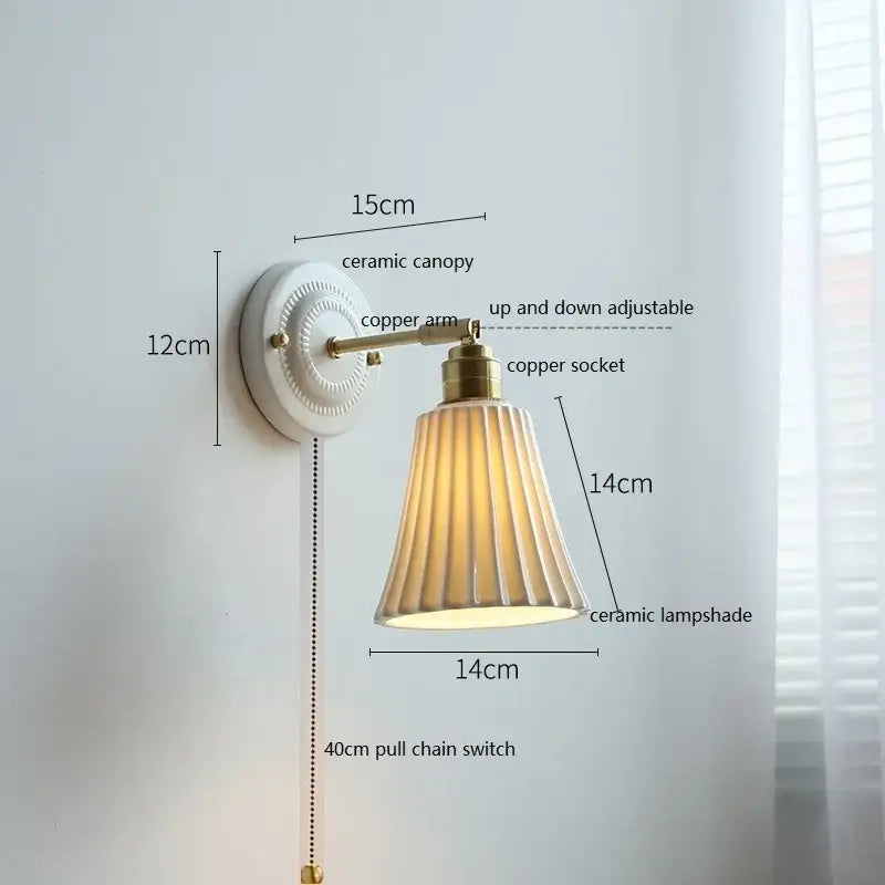 Fluted cream ceramic wall lamp with brass accents – bathroom light