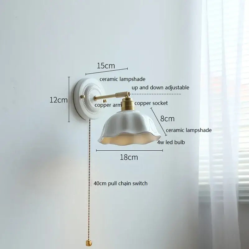 Fluted cream ceramic wall lamp with brass accents – bathroom light