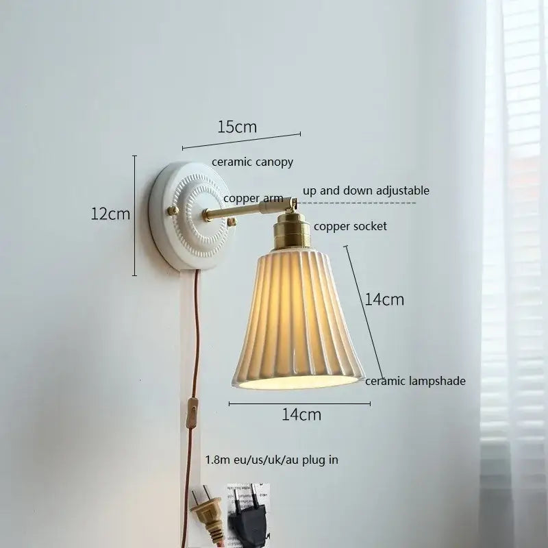 Fluted cream ceramic wall lamp with brass accents – bathroom light