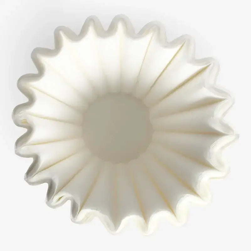 Fluted white disposable paper coffee filters kitchen basket style