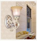 French country gold wall sconce with opaline glass – living room