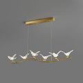 Gold bird branch led pendant lamp with five clear crystal bird fixtures on gold-toned branch and adjustable chain cord length