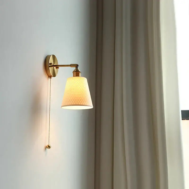 Gold ceramic led wall sconce with ribbed shade for bedroom