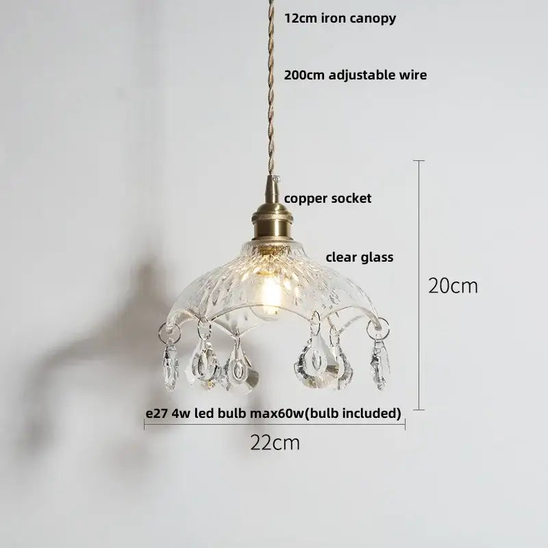 Green glass pendant light with copper canopy for dining room