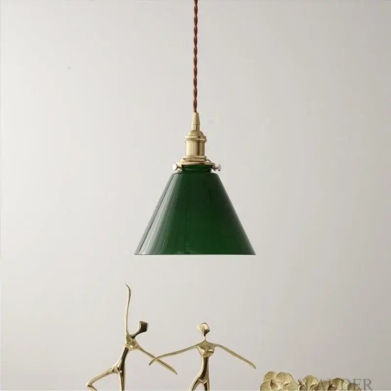 Green glass pendant light with copper canopy for dining room