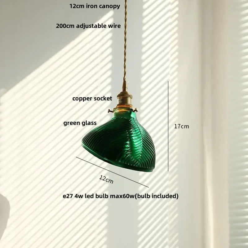 Green glass pendant light with copper canopy for dining room