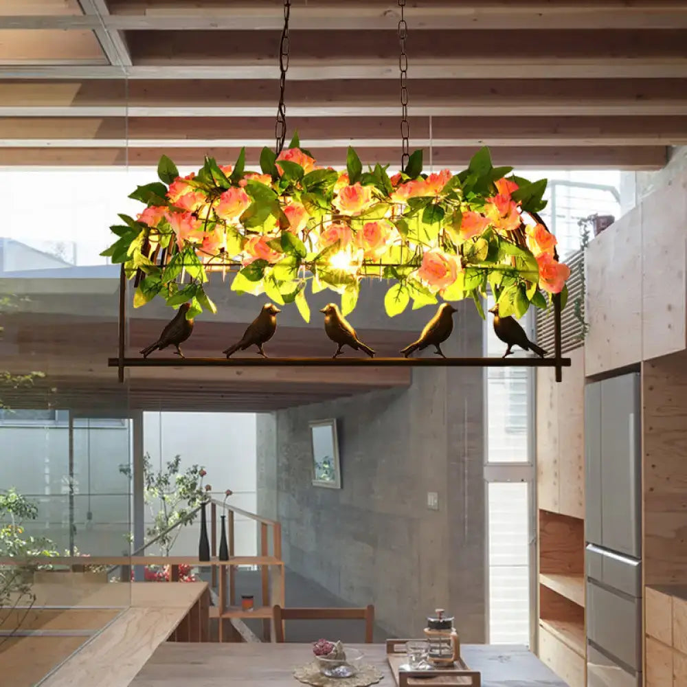 Industrial birdcage island pendant with roses – kitchen dining room