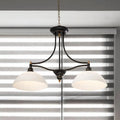 Black wrought iron industrial black dome island light fixture with opal glass and brass accents for dining table lighting