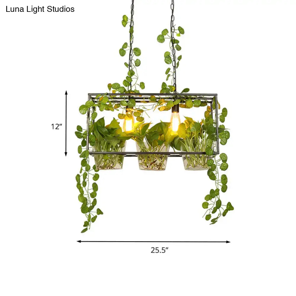 Industrial black island pendant light with potted plant dining room