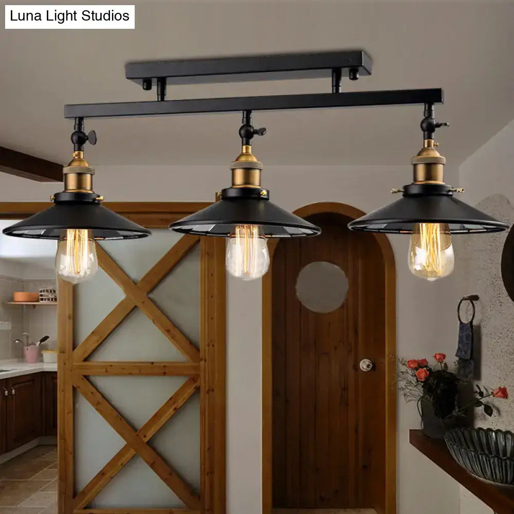 Industrial black metal and brass ceiling light fixture dining room