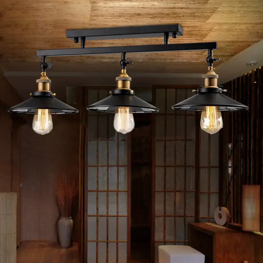 Industrial black metal and brass ceiling light fixture dining room