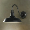 Black wrought iron farmhouse-style wall light with curved arm and metal pot lid shade for led incandescent fluorescent bulbs