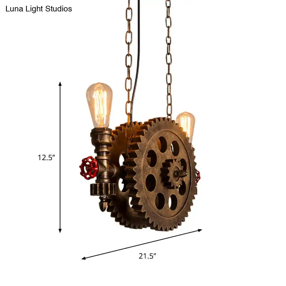 Industrial brass gear pendant light dining room with red accents