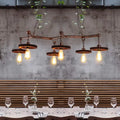 Industrial copper metal island lamp with five exposed edison bulbs and gear-shaped metal shades for dining room use