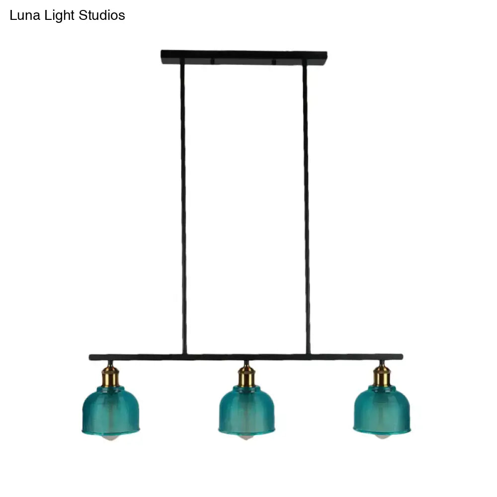 DecorBites™ industrial black pendant lamp with teal glass, brass accents, and red yellow blue bowls for island lighting