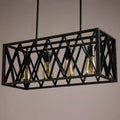 Black ironwork rectangular island light with industrial style lattice design and four exposed edison bulbs for kitchen