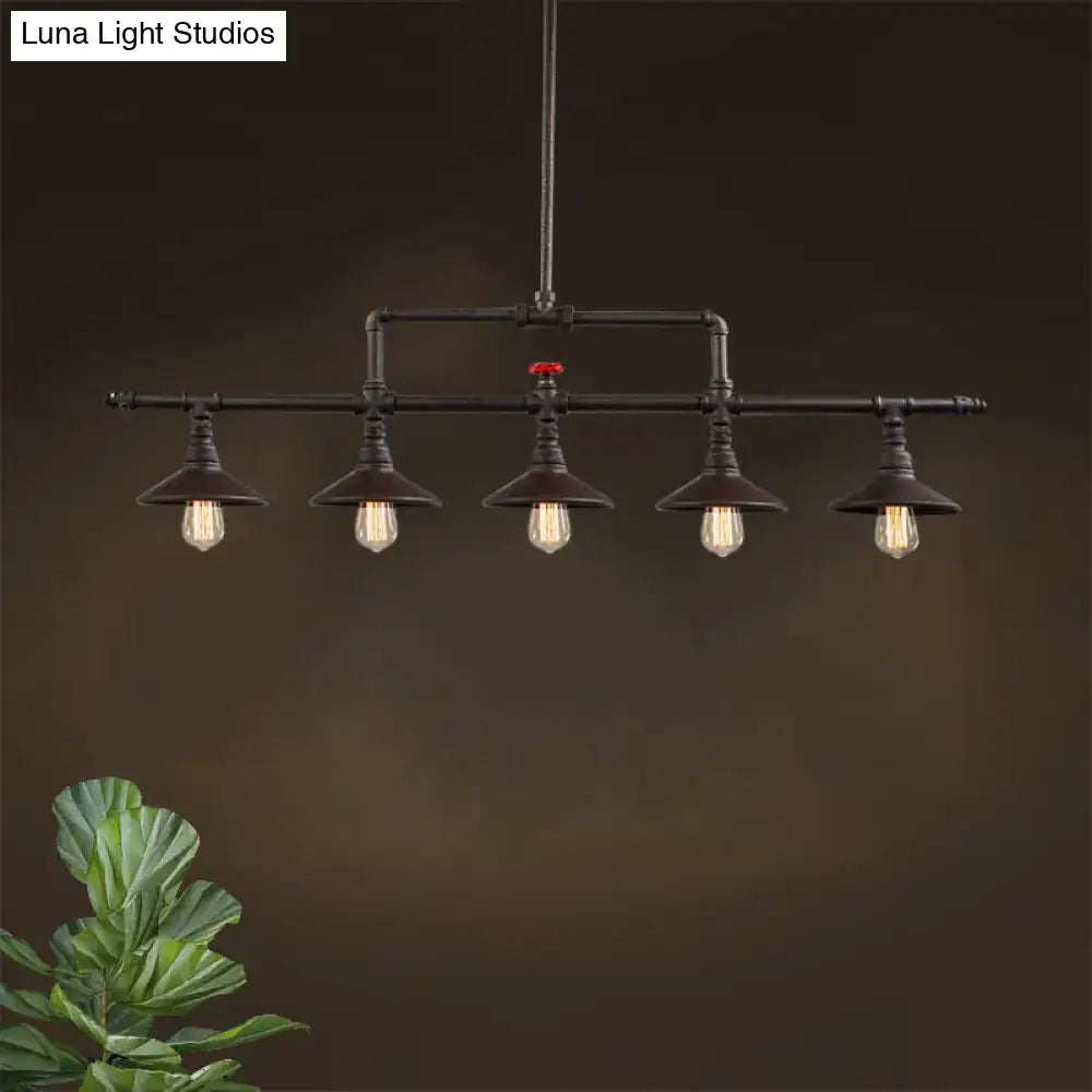 Industrial style rust pendant light with red valve – dining room