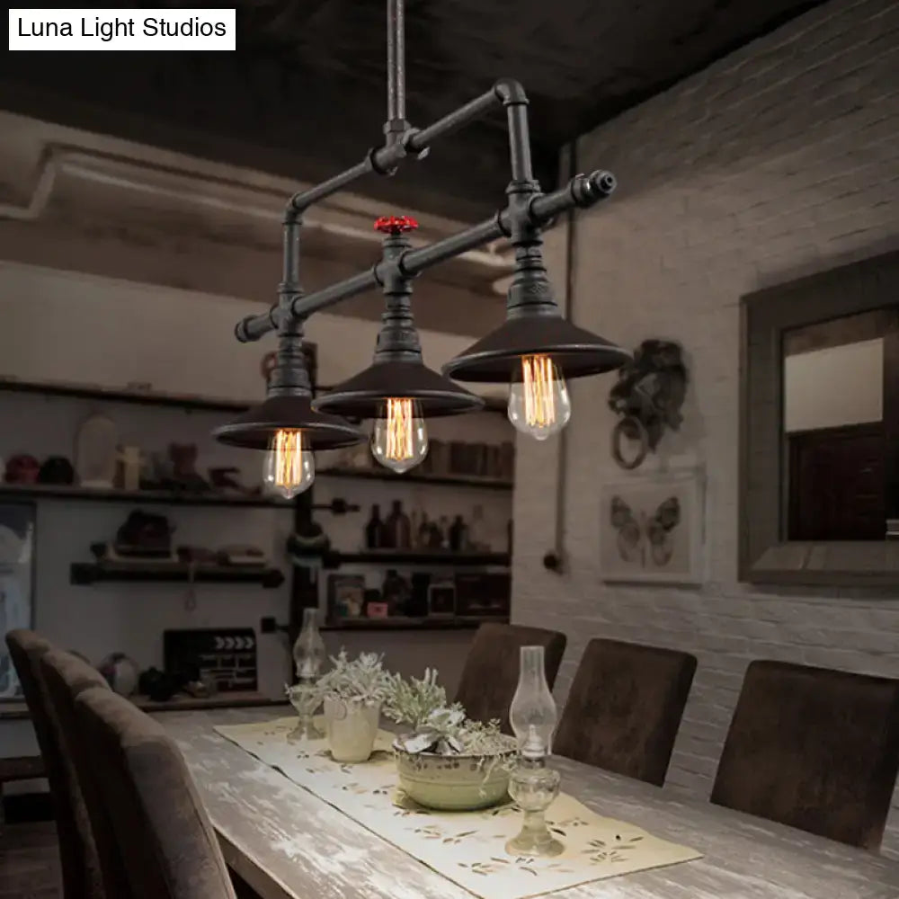 Industrial style rust pendant light with red valve – dining room
