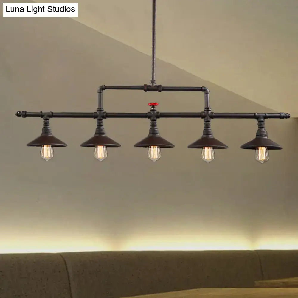 Industrial style rust pendant light with red valve – dining room