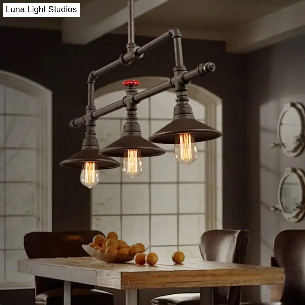 Industrial style rust pendant light with red valve – dining room