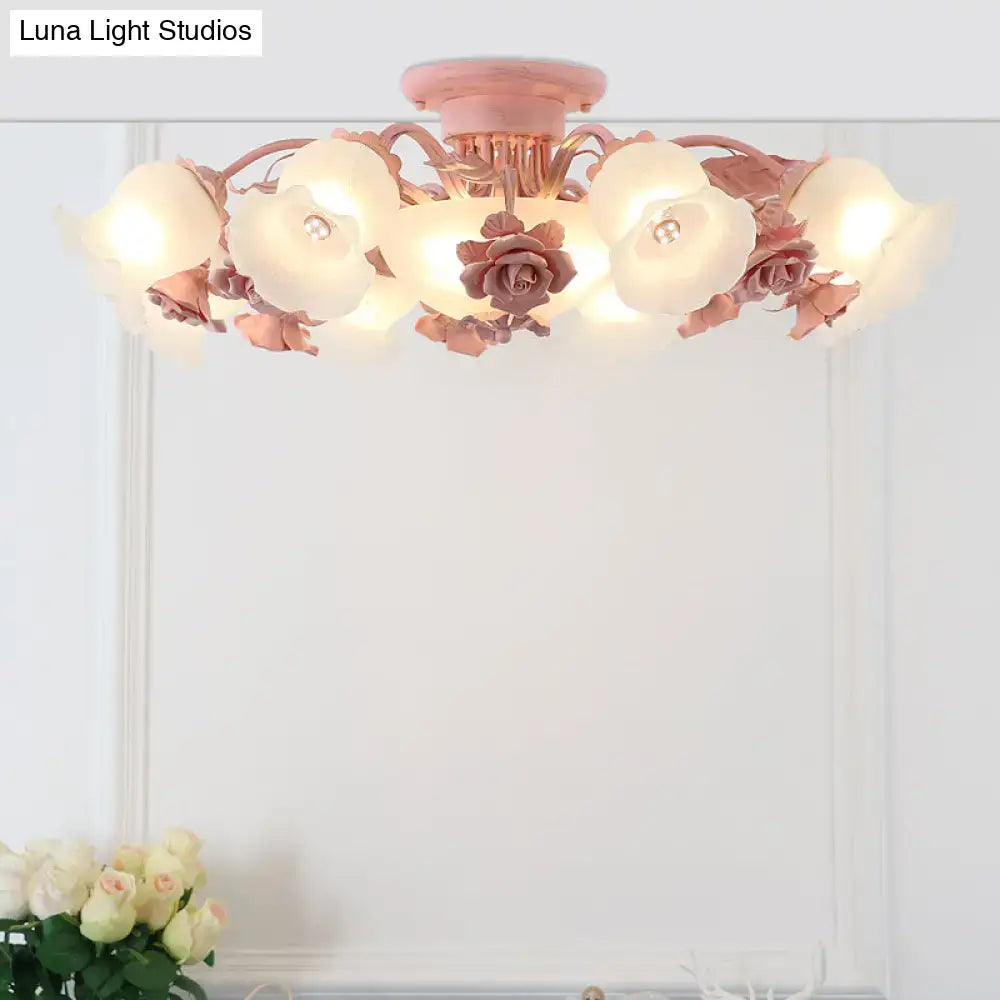 Pink rose-themed ceiling light fixture with frosted glass flower shades and metallic accents for korean garden flower decor