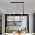 Decorbites black island pendant light with clear crystal cylinder shades and decorative white bird accents
