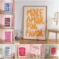 A framed decorbites™ wall art canvas featuring a bold orange kind love quote on light pink with a white heart symbol