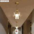 Gold-finished DecorBites™ luxury single head pendant light with crystal droplets and glass shade for dining room use