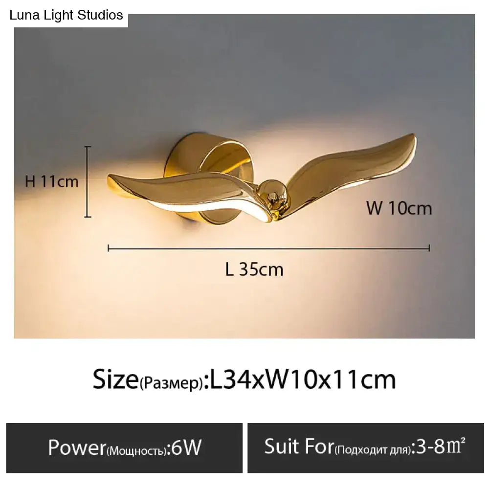 Luxury minimalist creative gold-colored wall-mounted seagull lamp for bedroom and living room lighting decor