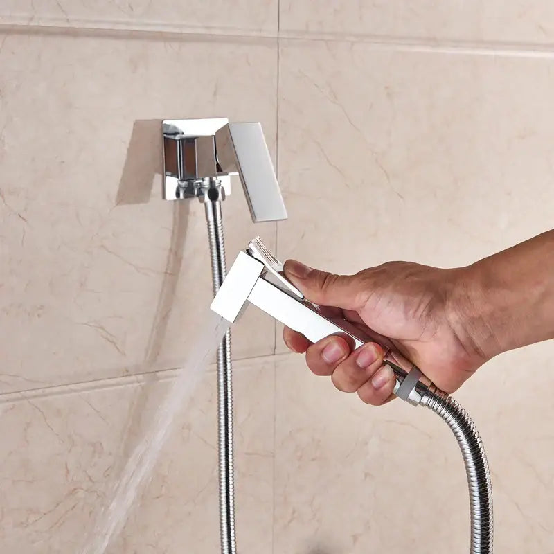 Matte black brass bidet faucet with handheld spray for bathroom