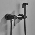 Matte black brass bidet faucet with handheld spray for bathroom