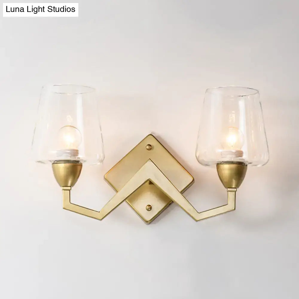 Mid-century brass wall lamp with truncated cone shade for bedroom