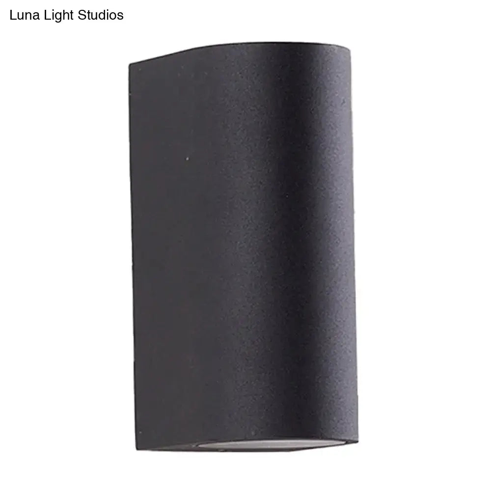 Minimalist black aluminum outdoor cylinder wall light outdoor space