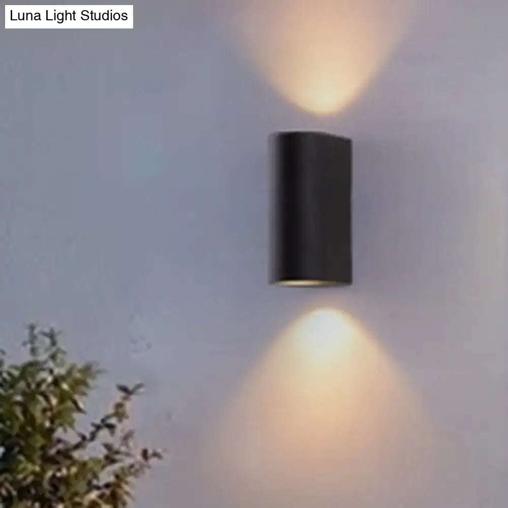 Minimalist black aluminum outdoor cylinder wall light outdoor space